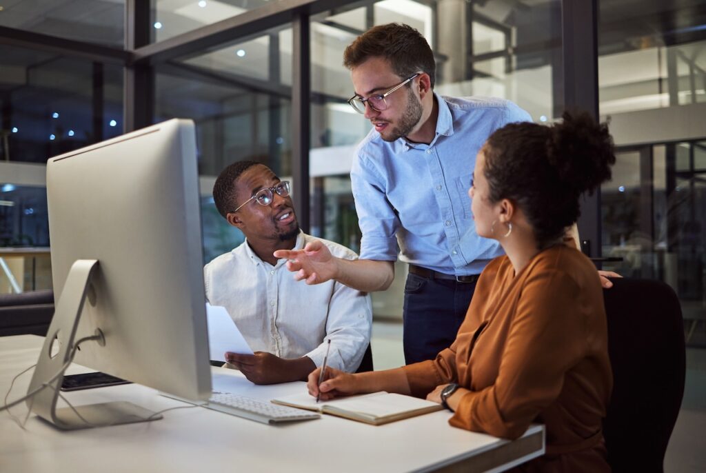 employees discussing it outsourcing